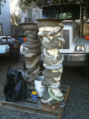 The first coat of Darjit is added to the old vent pipe & swimming noodles on th